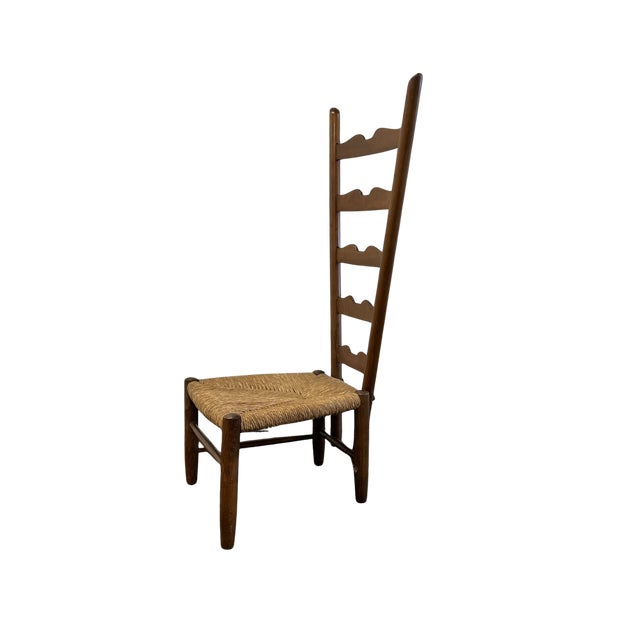 This striking vintage side chair, attributed to iconic Italian designer Gio Ponti, features his signature exaggerated high...