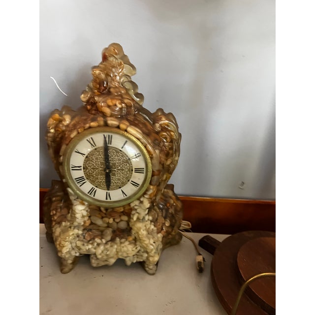 Up for consideration is a beautiful vintage resin seashell nautical standing clock. This would look lovely in your home,...