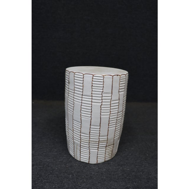 MCM ceramic garden stool with geometric pattern.