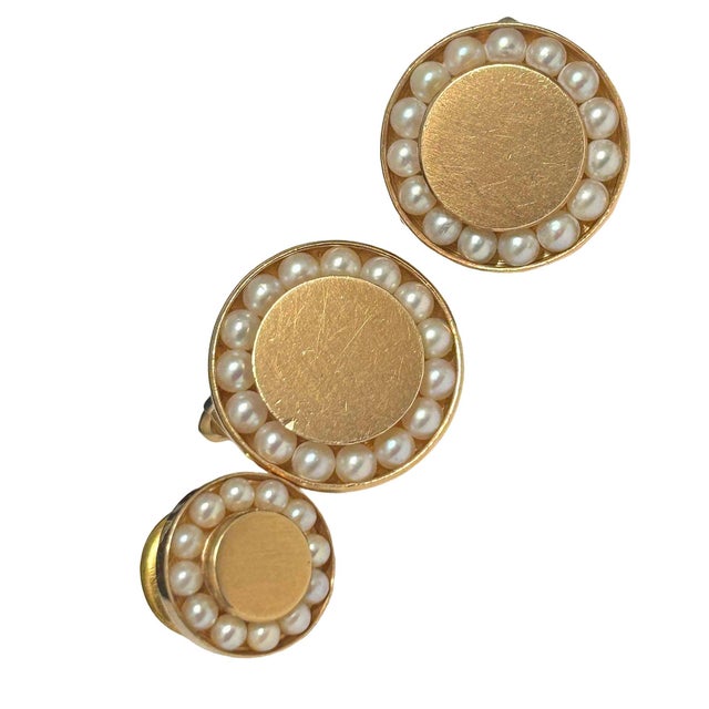Mid-century era round 14-Karat Gold & Pearl Bullet Back Cufflinks with matching Lapel Pin. Each cufflink features 15 deep-...