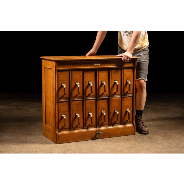 c. 1900s/1910s; Yawman and Erbe Manufacturing Co. - Rochester, NY Antique wooden filing cabinet with vertical file...
