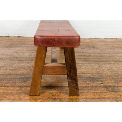 A Mingei style A-Frame rustic wooden bench made of East African railroad ties. Immerse your home in the rustic charm and...