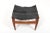 Illum Wikkelsø ottoman in teak and black leather. Model no.272. Produced in 1960s. Original leather. Very good vintage...
