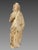 16th-century alabaster sculpture of Saint Anne Depicts Saint Anne, crowned, holding a book upon which rests a crown...