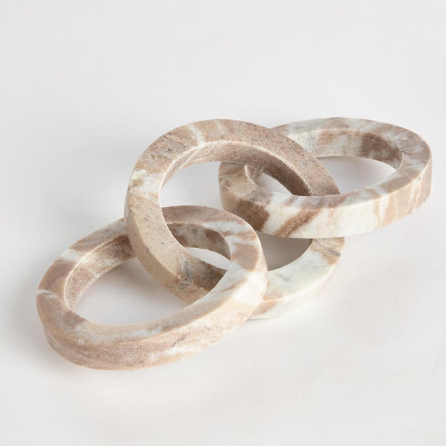 Honed to a semimatte finish, this stunning marble is specifically known for its unique darkBrown to lightBrown broad...