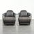 This set of 2 rugged industrial black cowhide Aviator design armchairs is finished with aluminum and rivets. They feature...