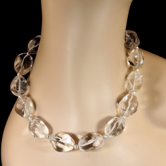 This 18‑inch clear quartz nugget necklace brings a refreshing blend of natural beauty and effortless elegance to any...