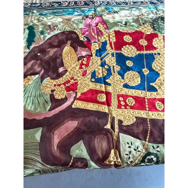 A striking vintage handcrafted wall textile depicting a regal Mughal elephant procession. This impressive textile (52” x...