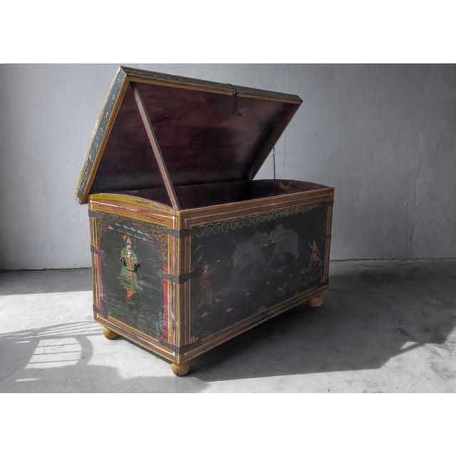 This vintage wooden trunk appears to originate from India and dates to approximately the late 1800s. It is extremely...