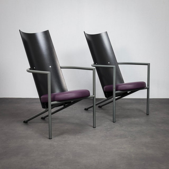 A stylish postmodern seating set from the 1980s, consisting of two armchairs and a matching side table. The combination of...