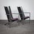 A stylish postmodern seating set from the 1980s, consisting of two armchairs and a matching side table. The combination of...