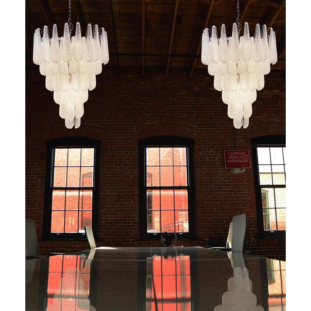 Gorgeous italian vintage chandeliers each made from 75 great hourglass murano glass. Period:late xx century dimensions:65...