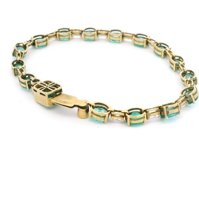 1990s 18k Yellow Gold Colombian Emerald and Diamond Line Bracelet, 7.5 Inches For Sale - Image 9 of 10