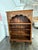 Design Plus Gallery presents a Vintage Carved Wood Open Bookcase. The tall rectangular frame is detailed with geometric...