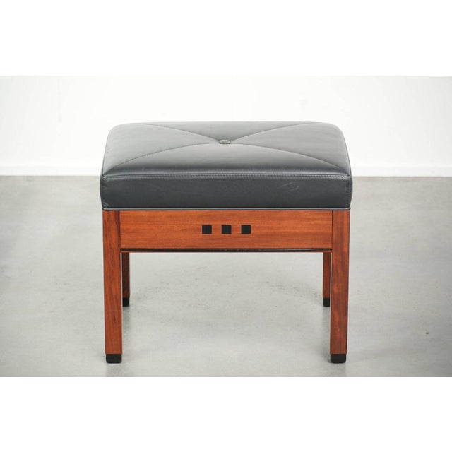 This black cowhide leather designer ottoman in Art Deco style comes from the Decoforma series by the top Dutch brand...