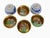 Here are six, matching per set, porcelain sake cups. I was told these were representative of six Japan gods? Hand painted...
