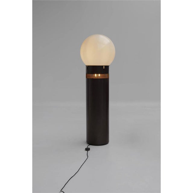 Oracolo floor lamp designed by Gae Aulenti and produced by Artemide. Metal structure and blown glass shade, Italian made....