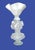 The object is a sculptural frosted glass decorative piece, like a centerpiece, likely Art Deco-inspired with strong...