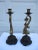 A pair of large brass koi fish, or possibly dolphin, candlestick holders on a cast metal base. Each candlestick is 16" in...