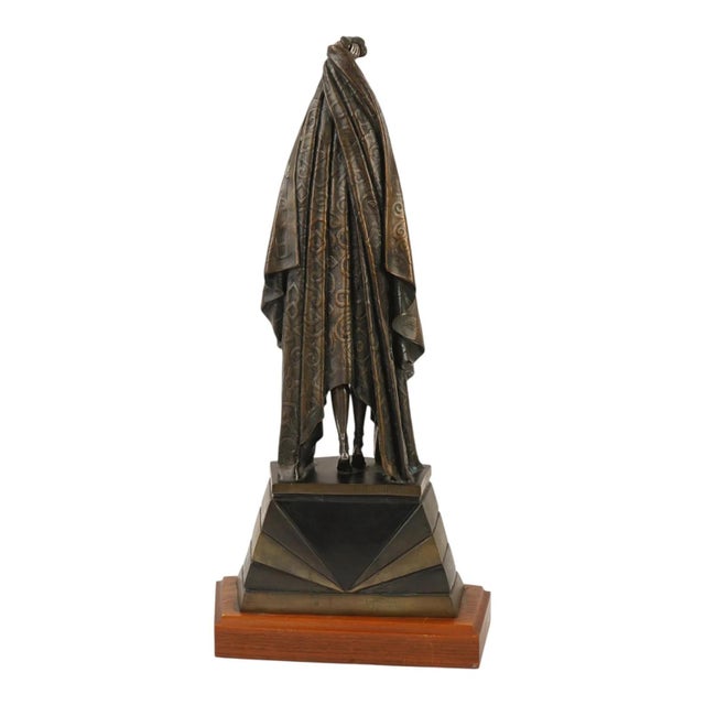 A vintage Art Deco bronze and sterling silver Antinea sculpture attributed to Demetre Chiparus, 1886, to 1947, a Romanian...