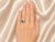 Material: 14K White Gold - elegant and durable Center Stone: Oval Alexandrite - natural, 0.7 carats Accent Stone:...