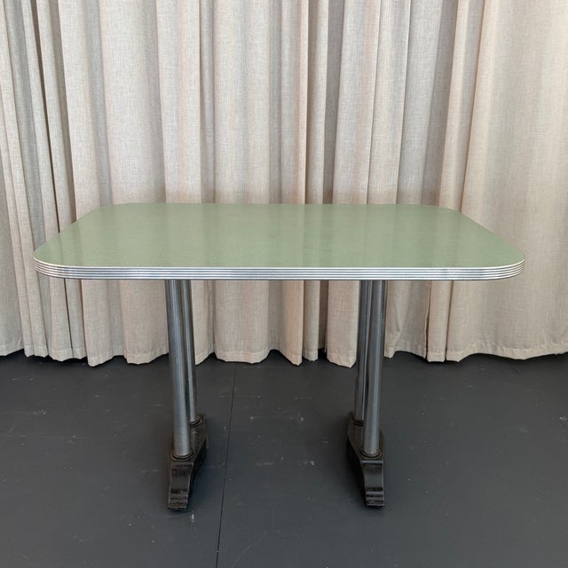 This charming mid-century, Art Deco Revival dining dinette table pairs Art Deco detailing with classic American nostalgia...