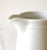 Superb vintage European porcelain white pitcher, manufactured in Brazil by Steatita. Want to explore more products at...