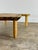 Handcrafted natural edge coffee table featuring an exceptional solid wood slab with striking, organic grain. The free-form...