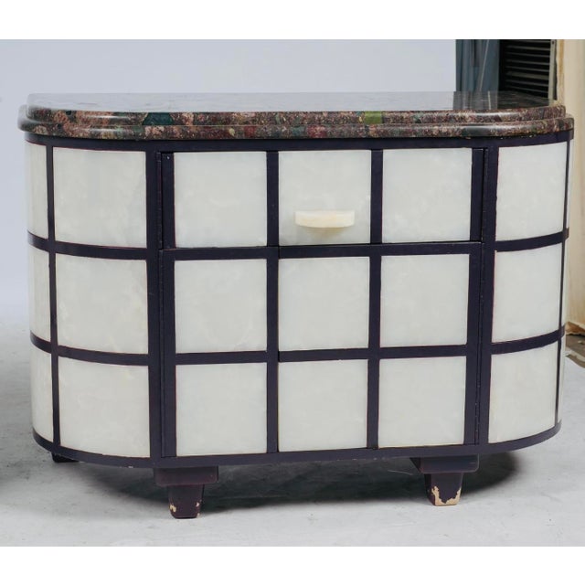 From the celebrated collection of Glorya Kaufman, these custom unsigned, sculptural Postmodern cabinets combine dramatic...