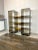 Bookshelf étagère cabinet by Gallotti & Radice, featuring chrome borders and two smoked glass columns with shelves linked...