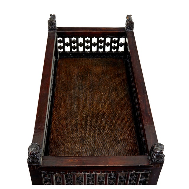 19th century chinese carved hardwood bed circa 1890. chinese export which we believe may have been made as a childs bed....