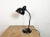 Vintage black industrial Bauhaus table lamp designed by Christian Dell and produced by Kaiser Idell in Germany during the...