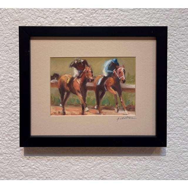 This pastel artwork captures the dynamic energy of a horse race, with two powerful horses galloping side by side, their...