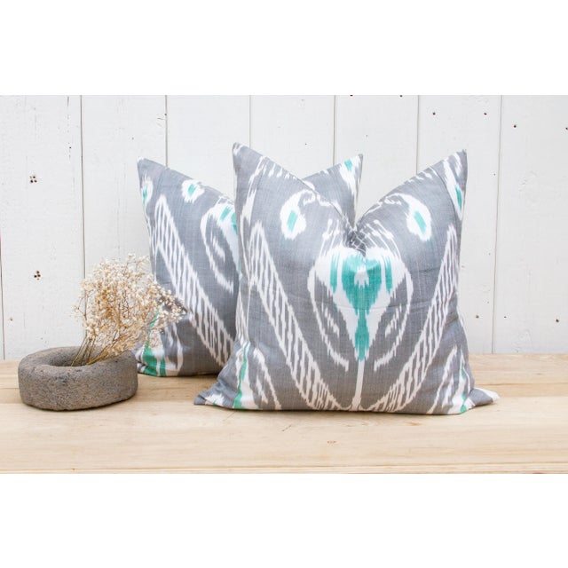 The ikat silk pillow is an exquisite art that combines the luxurious feel of silk with the intricate beauty of the ikat...