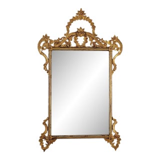 1975 Italian Hollywood Regency Giltwood Wall Mirror | Hand-Carved Gold Frame | 54” Tall For Sale
