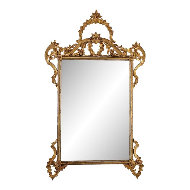 1975 Italian Hollywood Regency Giltwood Wall Mirror | Hand-Carved Gold Frame | 54” Tall For Sale
