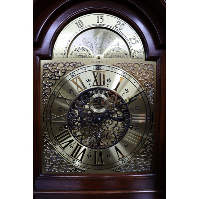 This Howard Miller Taylor grandfather clock is a beautifully crafted example of traditional American clockmaking,...