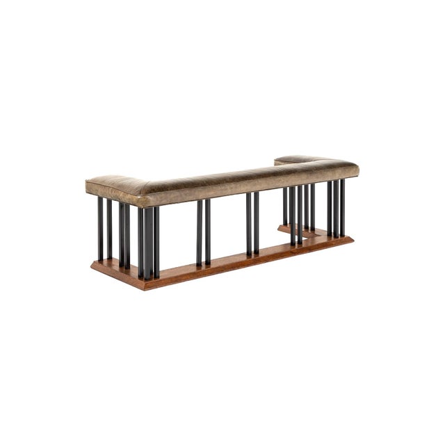 An outstanding over sized club fender with a comfortable sumptuous olive green leather seat. The seat is raised on an oak...