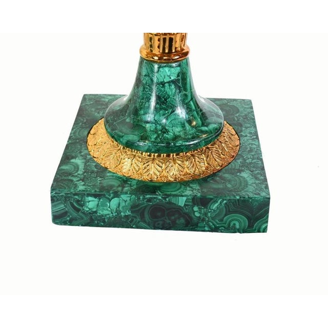 Magnificent pair of decorative malachite urns in the French Empire style Richly figured green malachite bodies with finely...