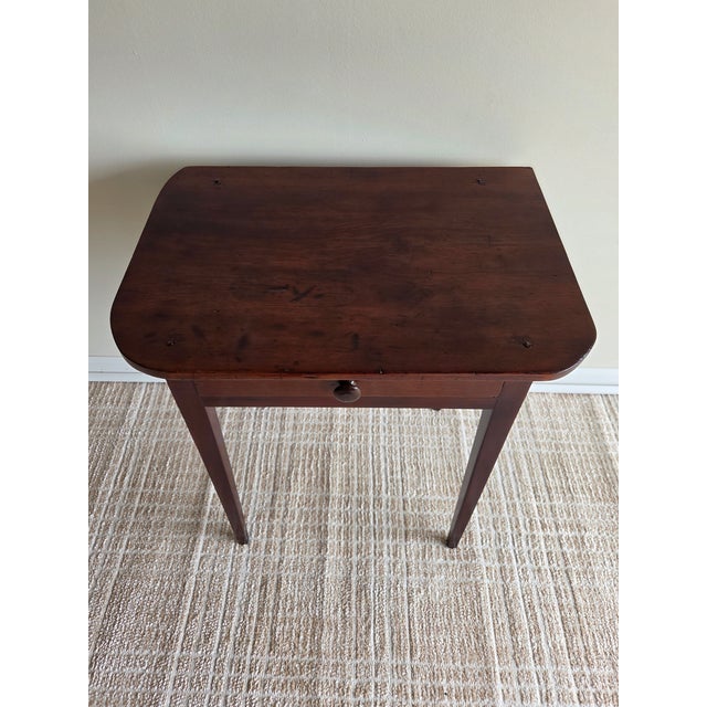 This is an antique American country primitive one drawer stand, constructed of pine and mixed woods with a dark heavy...