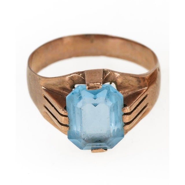 Vintage 10K Yellow Gold Blue Gemstone Solitaire Cocktail Ring, circa 1960s-1970s. The center stone is held in a...