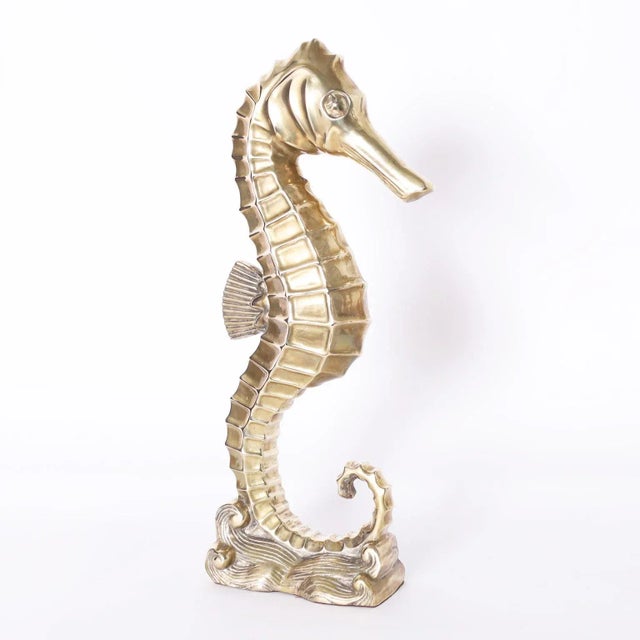 Striking vintage cast brass seahorse sculpture or object of art with a dramatic stylized form. Please see our other...