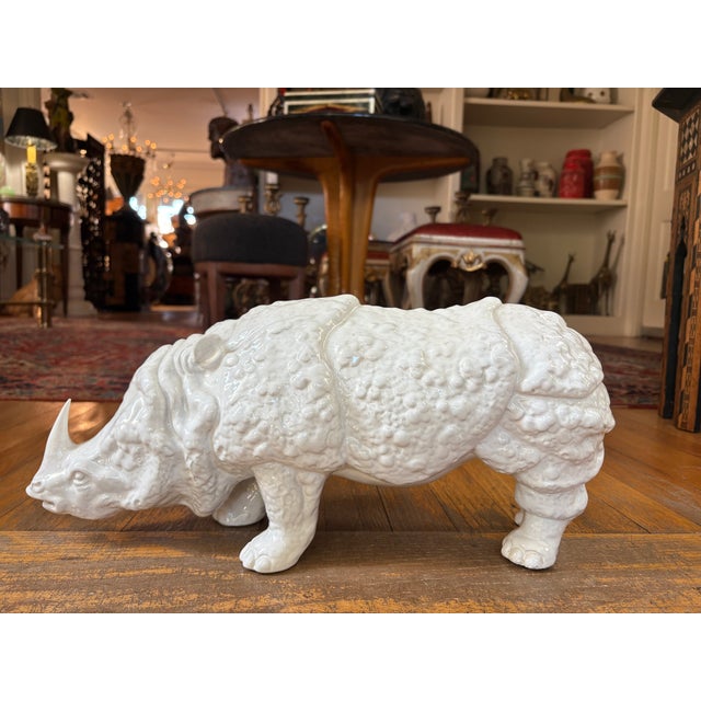 Italian Modern Glazed Ceramic Rhinoceros. Offered is an Italian white glazed ceramic Rhino. This stunning large Italian...