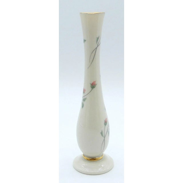 This vintage Lenox Rose Manor bud vase is made of ivory colored porcelain with 24 K gold trim. It is 7 3/8" tall with a 1"...