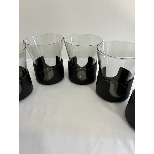 A striking set of six Glas-Snap II tumblers by Corning, sourced from our vintage finds sourcing. Smoke-toned glass cups...