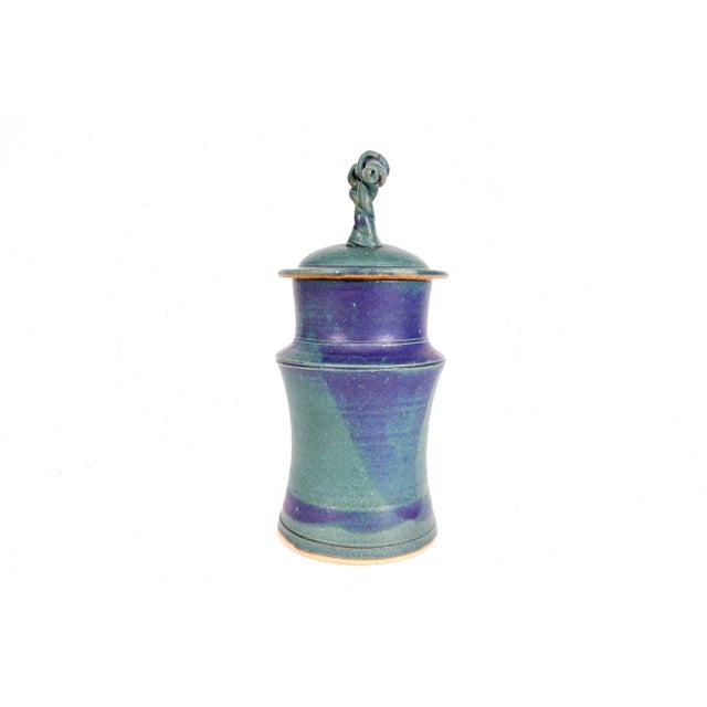 Lovely royal blue and turquoise glaze lidded vessel by acclaimed Iowa potter Mark Chamberlain. The piece is signed and...