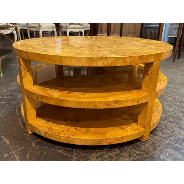 The Custom 3 Tier Milo Baughman Manner Burlwood Coffee Table is a unique and stylish piece of furniture for any home. Made...
