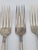 This set of five silverplate dinner forks features the striking Lady Betty pattern from International Silver Co. Unlike...