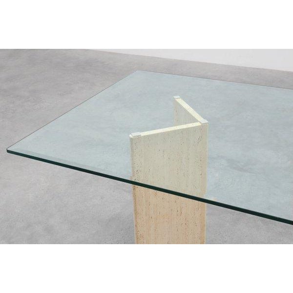 This refined mid‑century dining table from Italy, circa 1970, exemplifies the sculptural minimalism of postwar Italian...