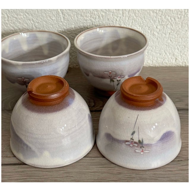 A set of four Hagi ware (萩焼) yunomi tea cups by Yuka Matsuo, Japan. Each measures 6.5 cm high × 8.5 cm in diameter (2.6 ×...